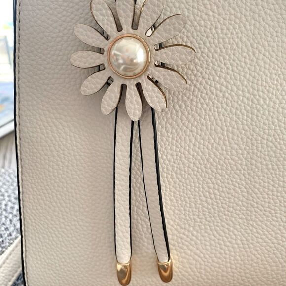 👜DIOPHY WHITE HANDBAG/PURSE w/white and pearl flower charm.  Adjustable strap. - Picture 9 of 11